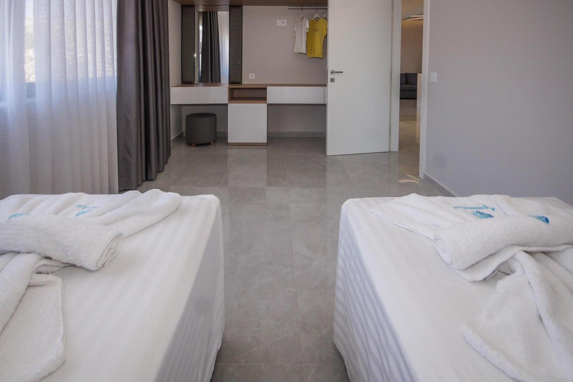 Aquamarine Luxury Suites Archangelos  Esterno foto