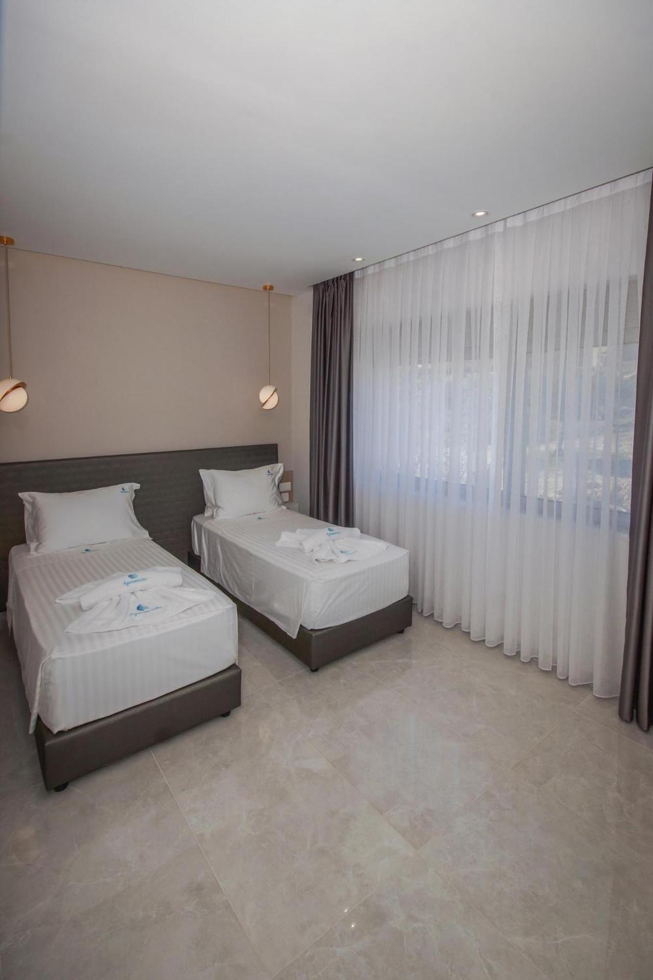 Aquamarine Luxury Suites Archangelos  Esterno foto