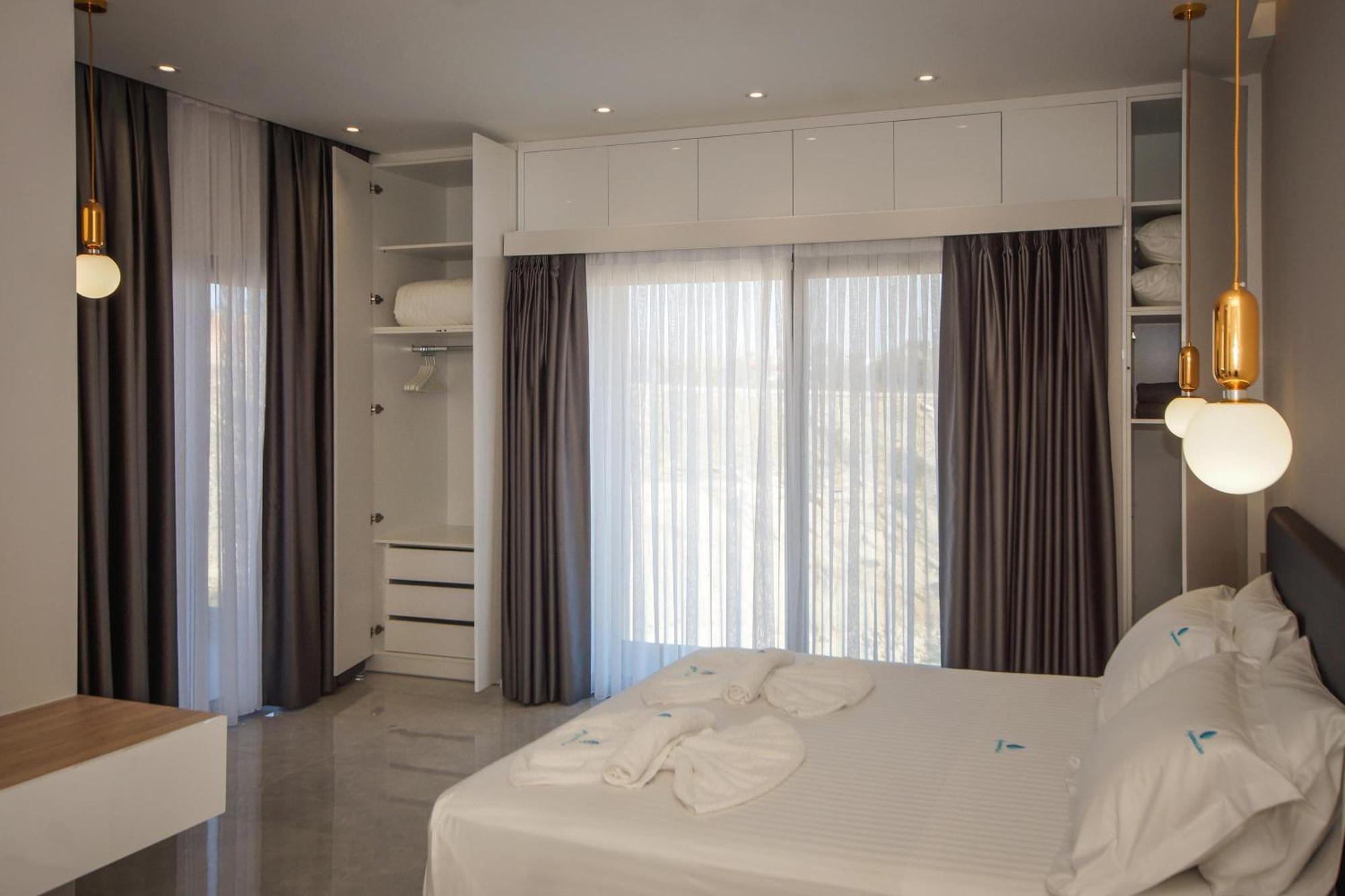 Aquamarine Luxury Suites Archangelos  Esterno foto