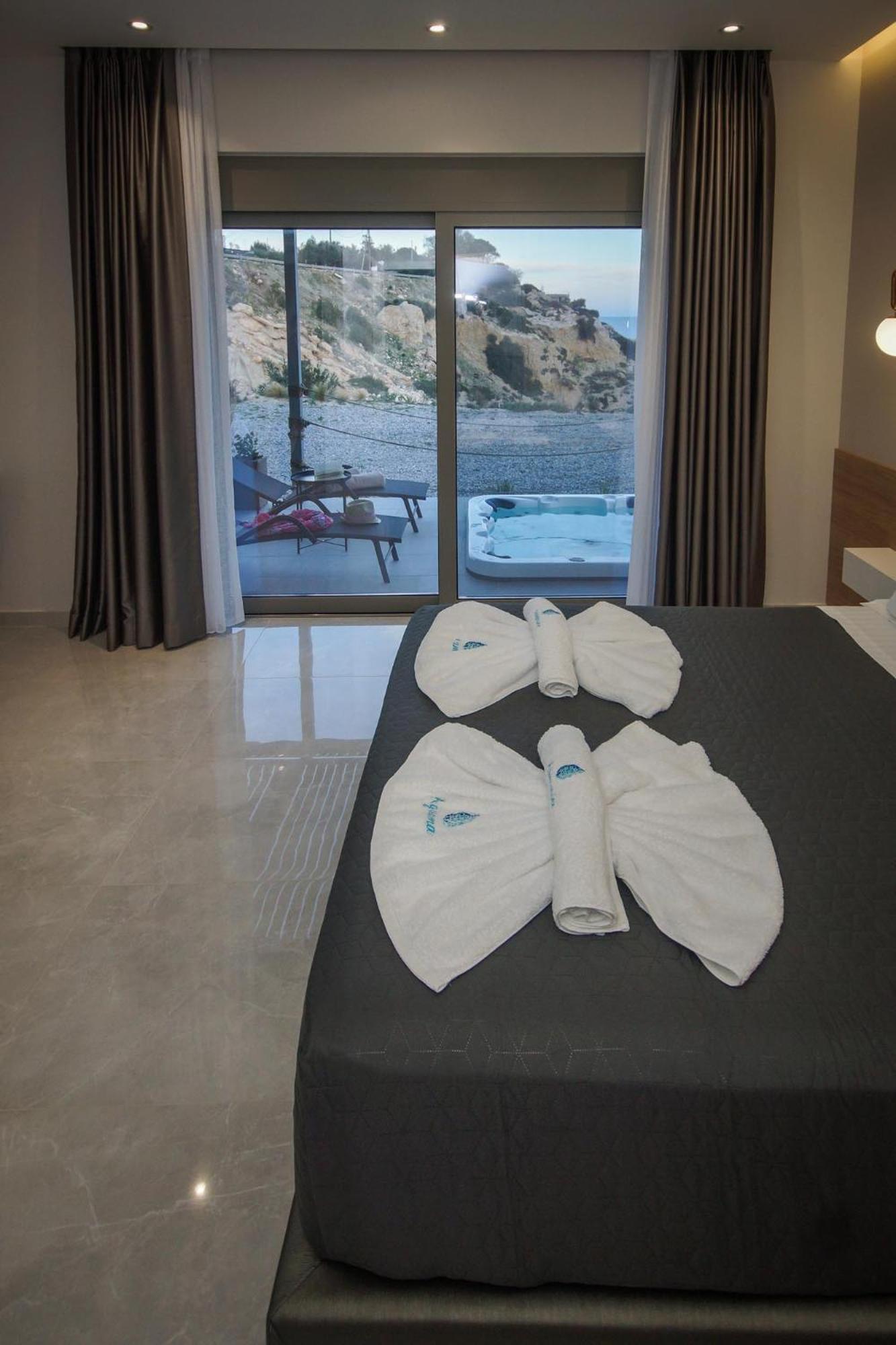 Aquamarine Luxury Suites Archangelos  Esterno foto